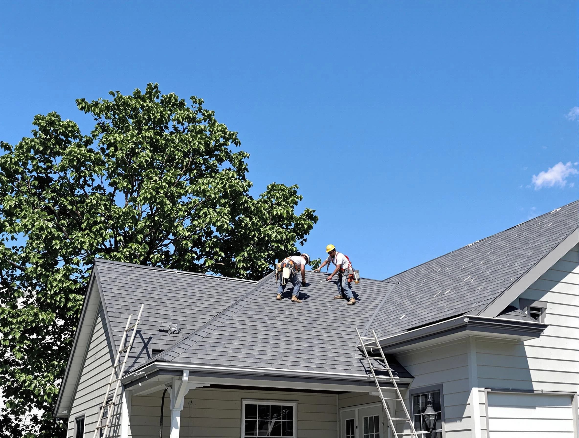 Westlake Roofing Company crew finalizing a roof installation in Westlake, OH