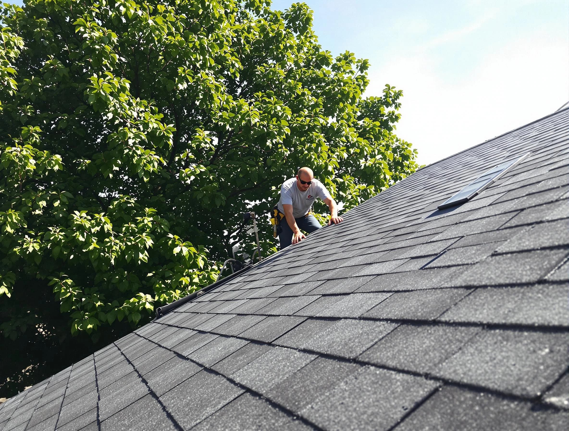 Certified roofers from Westlake Roofing Company working in Westlake, OH